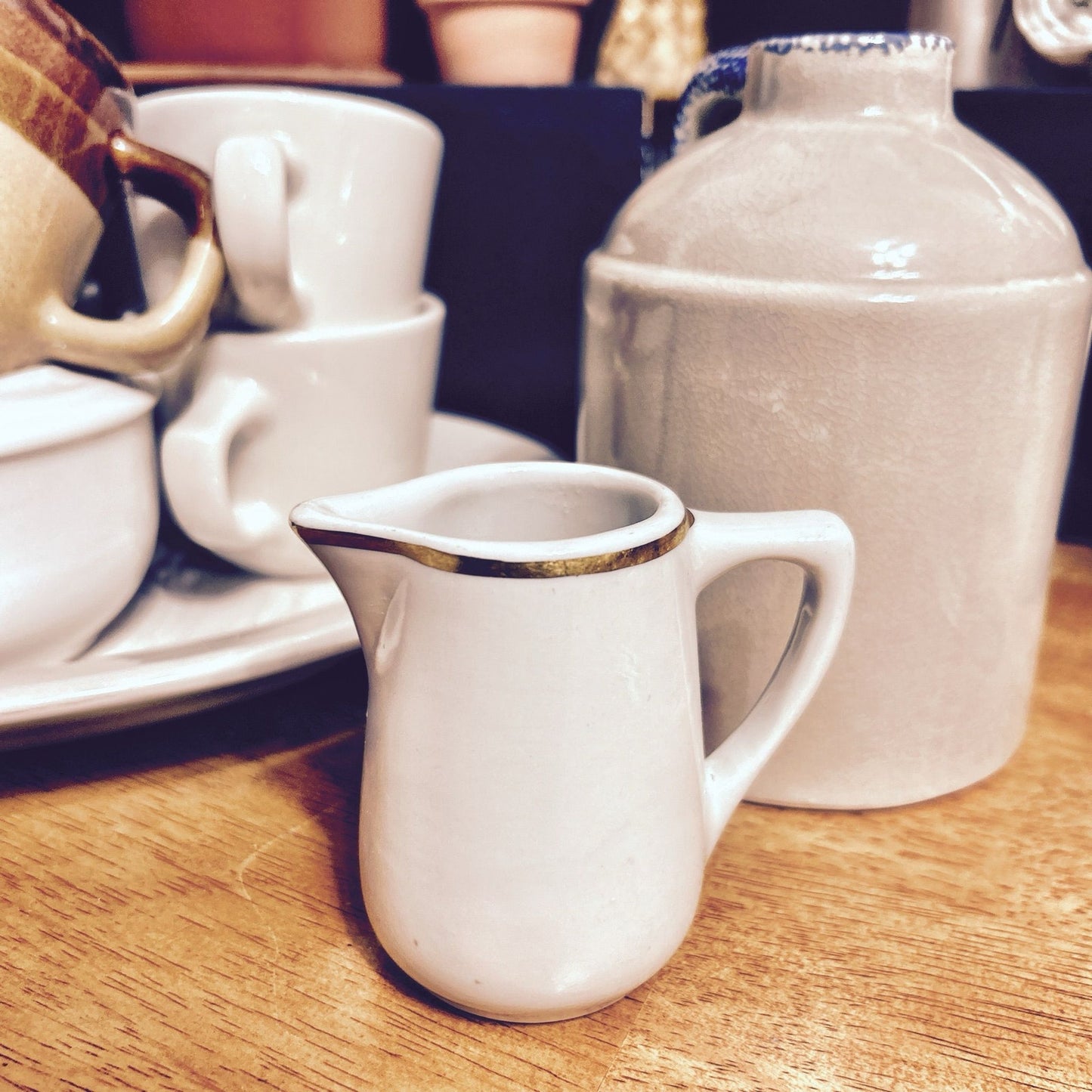 Creamer: Cream Color with Gold Trim; Ironstone Restaurantware Mayer
