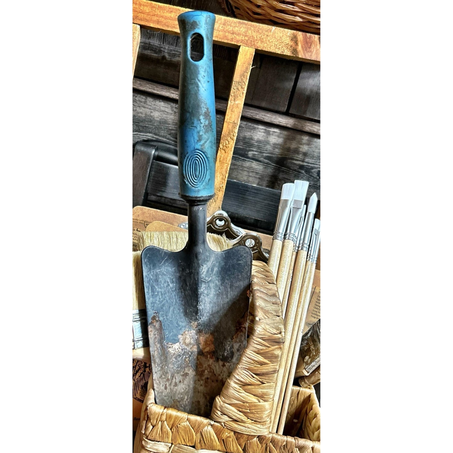 Tool: Rusty Crusty Hand Trowel with Blue Handle