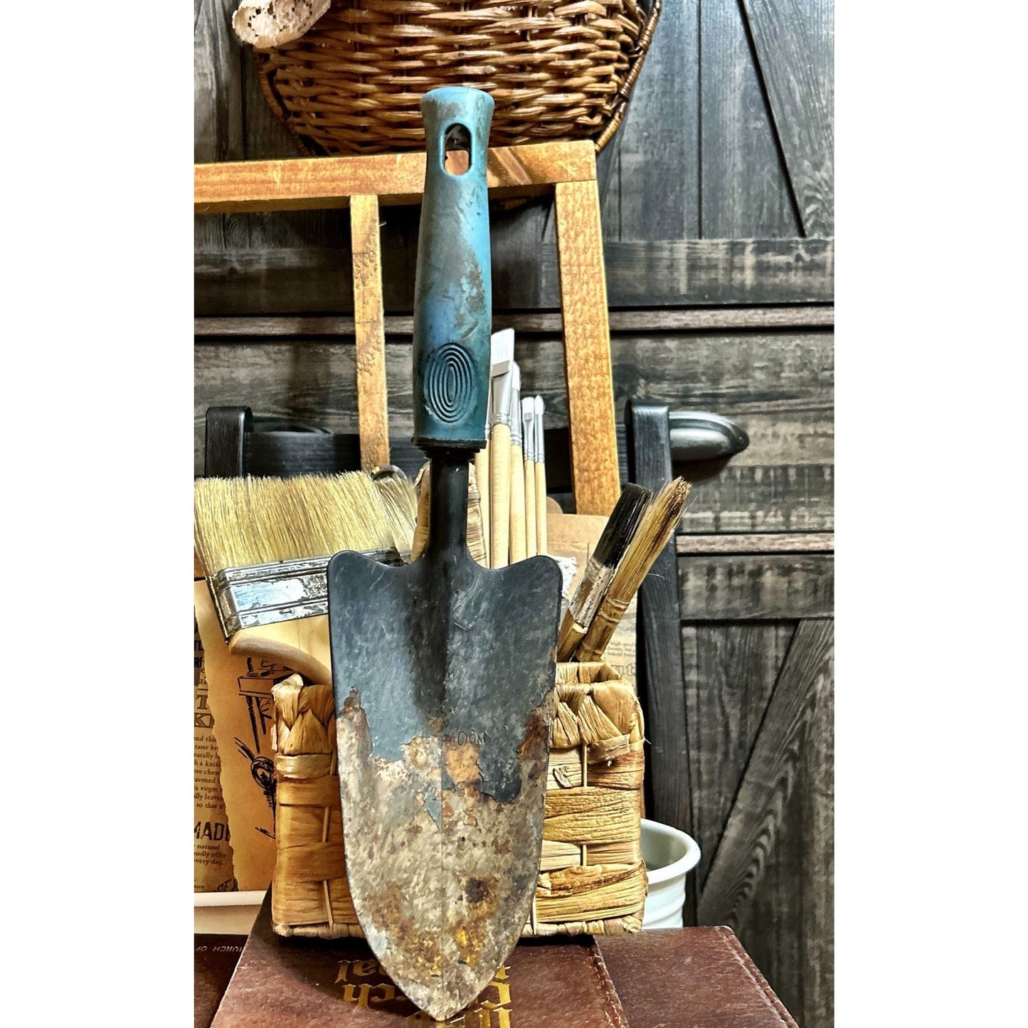 Tool: Rusty Crusty Hand Trowel with Blue Handle