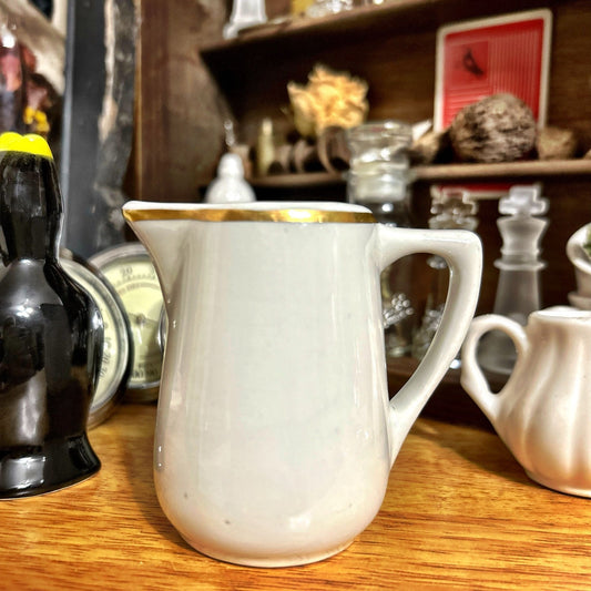 Creamer: Cream Color with Gold Trim; Ironstone Restaurantware Mayer