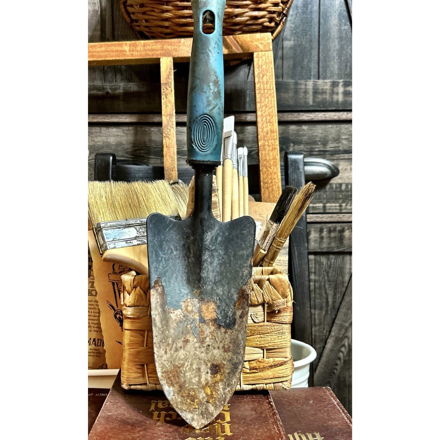 Tool: Rusty Crusty Hand Trowel with Blue Handle